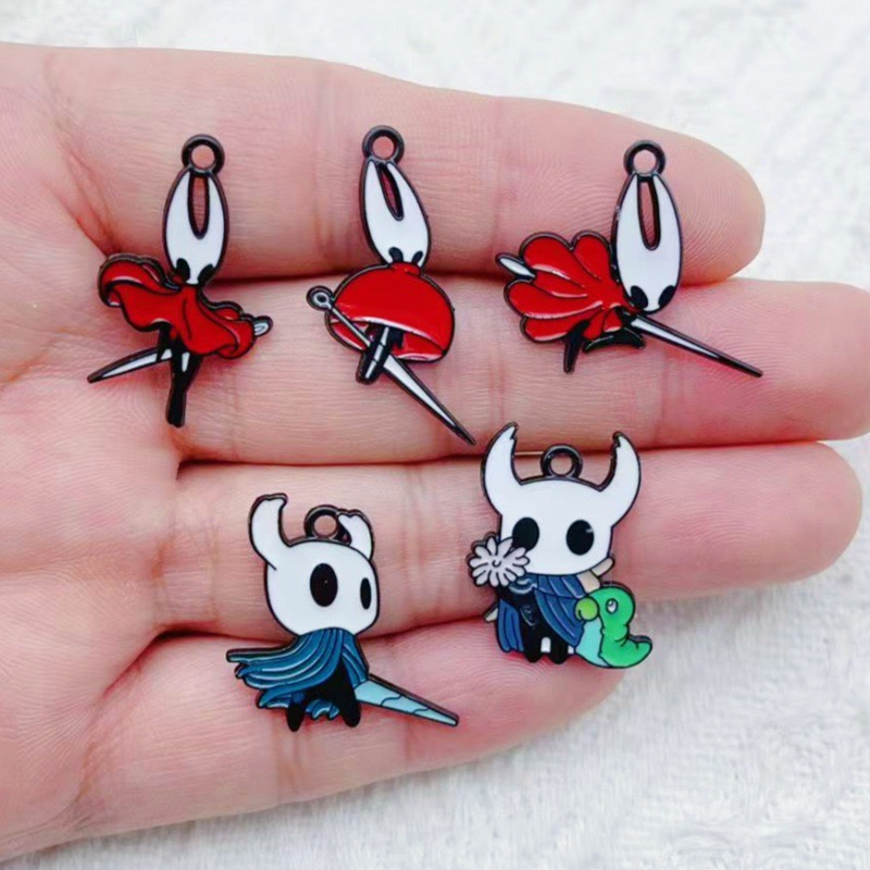 10 pendentifs en alliage motif - Party Games Crazy avis et prix